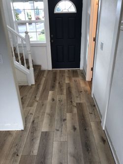 Laminate flooring 3/8” thick pad attached