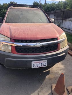 Chevrolet SUV Red with Roof Rack