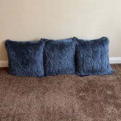 A Set Of Decorative Pillows 