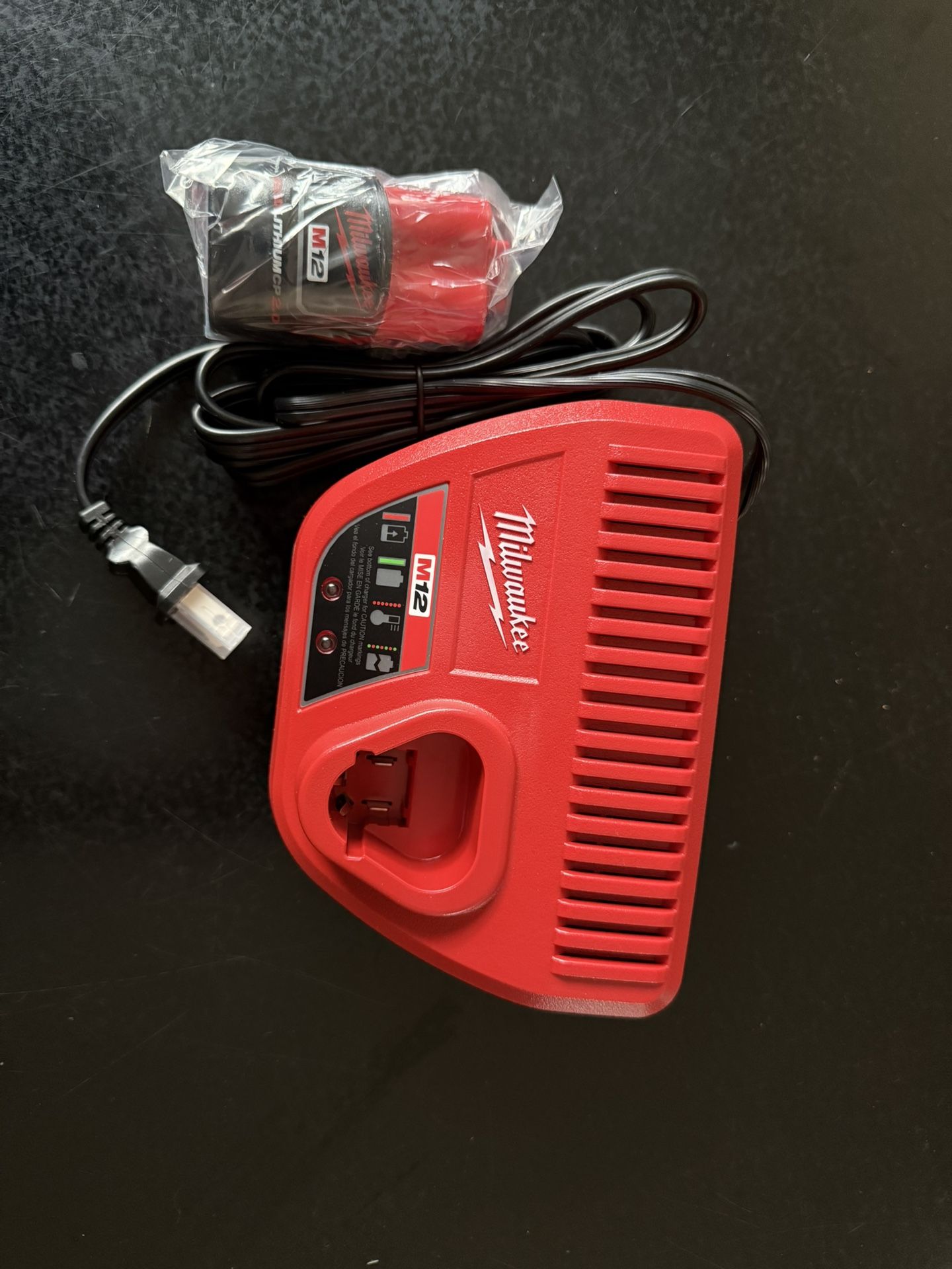 Milwaukee M12 2.0AH Battery And Charger