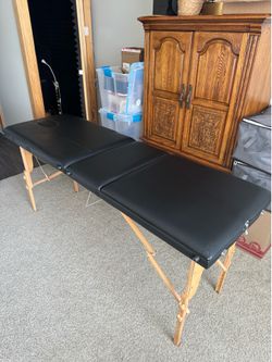 Portable massage table with adjustable backrest head arm rest