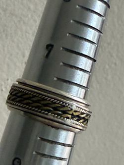 Sterling silver spinner ring braided rope