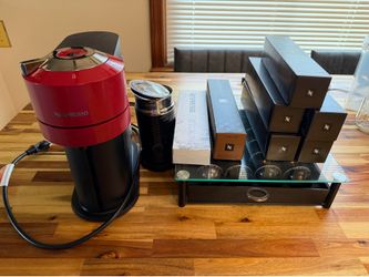 Nespresso Vertuo coffee machine, Aeroccino milk frother, and pods