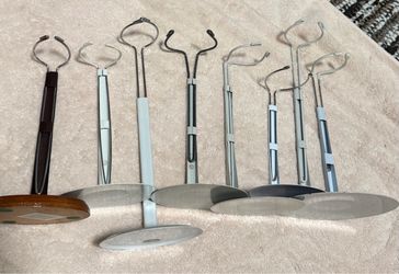 8 metal doll holder stands