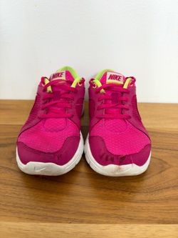 Nike Flex Experience RN 2 GS Sneakers in a bright pink and neon yellow-green colorway.