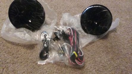 Brand new. Smoked fog lights and wire kit and switch