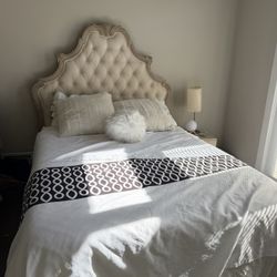 Bed With A  Mattress Almost Brand New 