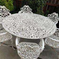 Antique Cast Iron Patio Table & Six Chairs