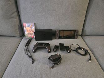 Nintendo switch  + pro controller  + Pokémon let's go Eevee