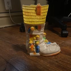 Vintage 70's Sanitoy "Old Woman Who Lived in a Shoe" Plastic Coin Bank USA