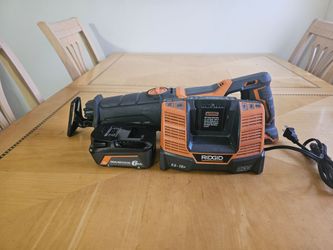 Rigid reciprocating  saw  rigid  battery  (6.0)  brand new  rigid charger   the saw is used but in great shape  charger is used
