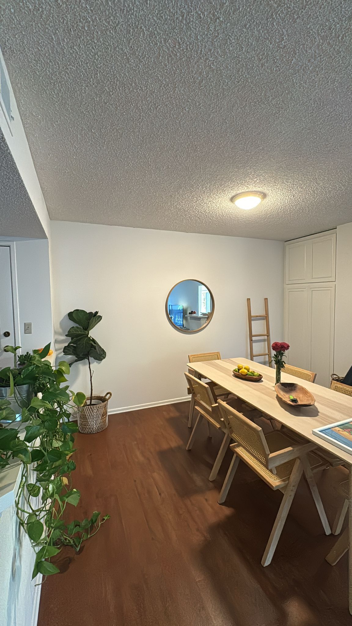WOOD DINING TABLE AND RATTAN CHAIRS