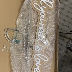 Neon sign “All You Need Is Love”