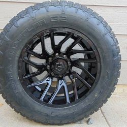20X12 TIS Gloss Black Rims LT 325 60 20 Nitto A/T Tires 8X6.5 & 8X170