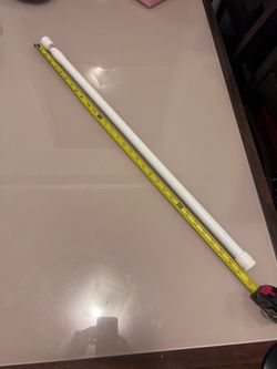 LIKE NEW - White Metal expandable tension rod.  31”-51” inches