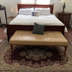 Cherrywood King or queen bed frame. 250