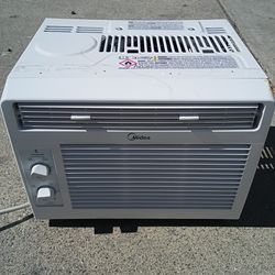 AC OMIDEA Semi Nuevo