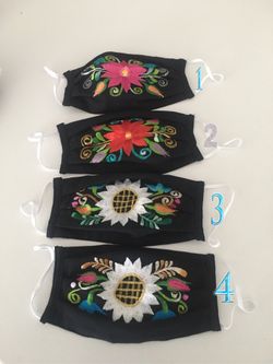 Embroidered mask with filter