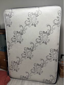 Full Size bed frame, box springs and mattress. Less than one year old. Always covered, used in guest room. Our loss your gain.