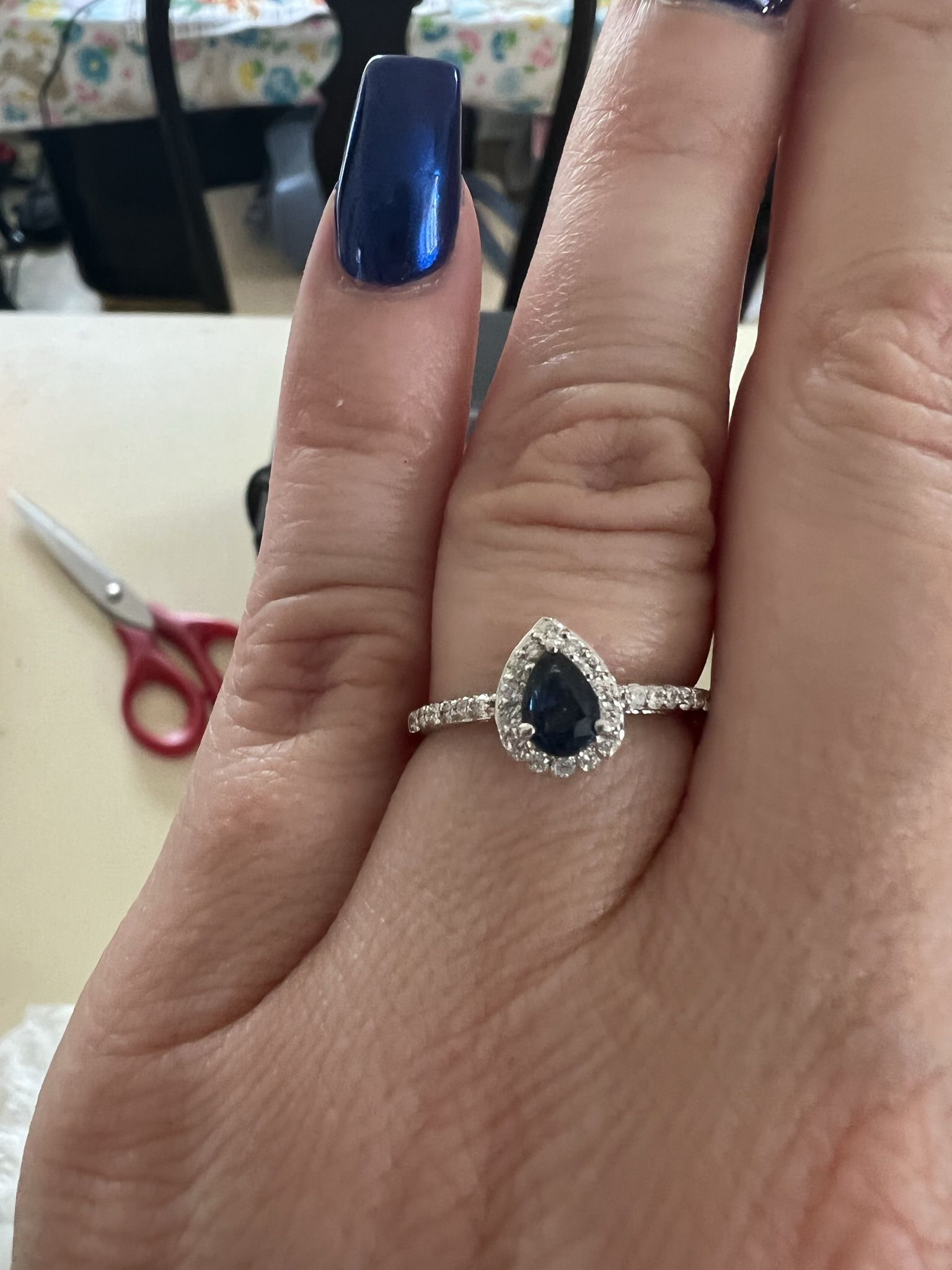 Pear-Shaped Blue Sapphire and 1/4 CT. T.W. Diamond Engagement Ring in 10K White Gold