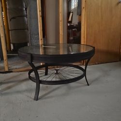 Awesome Glass Coffee Table With Metal Accent Spokes 