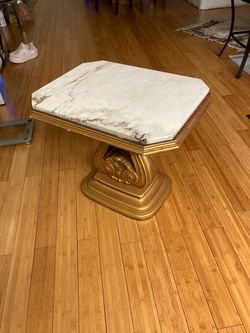23 inches tall marble table with gold bottom for $60