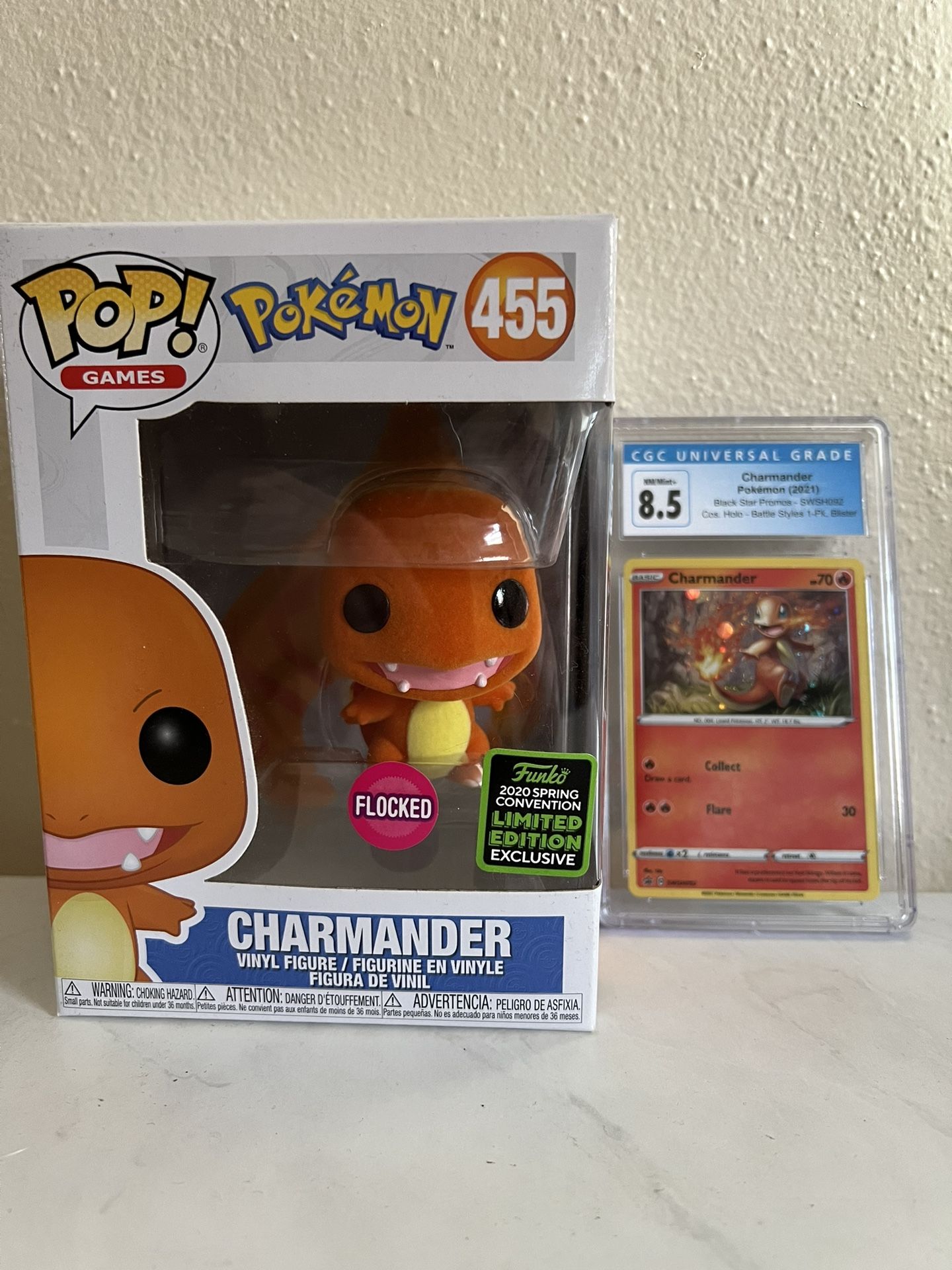 Graded Pokémon Card And Flocked Funko