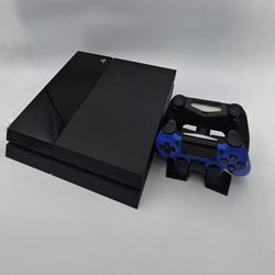 PS4 W/2 Remotes And GAMES