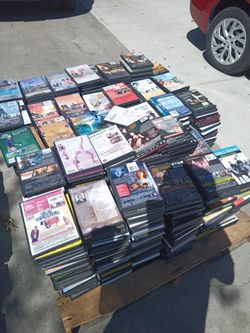 Large Pallet of mixed DVDs (Xtreme sports anime music horror )