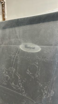 Stainless door, black body whirlpool fridge