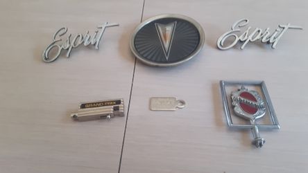 Vintage Pontiac and Oldsmobile emblems
