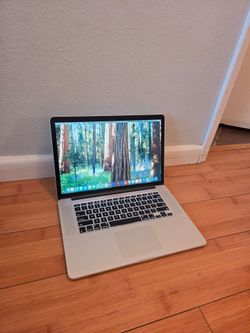 Macbook pro 15 in i7 16gb ram 512gb ssd, Adobe, ms office, charger 100% bat health or best offers