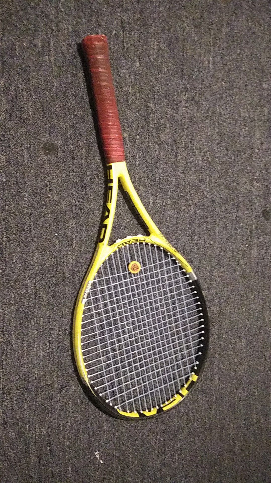 Head Extreme MP tennis racket with suppresor