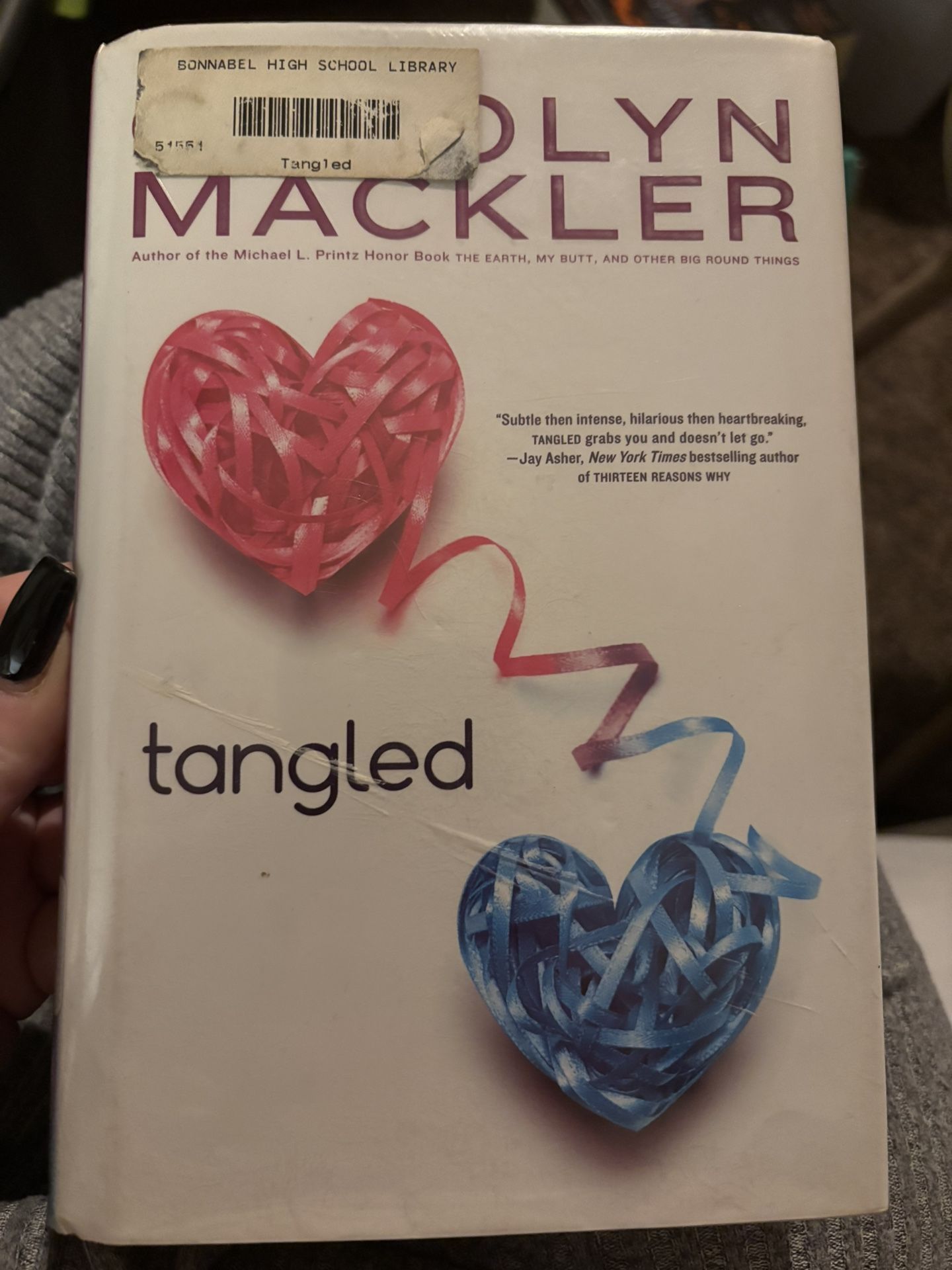 Tangled By Carolyn Mackler.