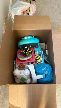 Assortment of books and toys for infant/toddler