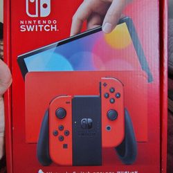 Nintendo Switch OLED - ( Mario Red Edition )