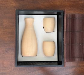 CARVED WOOD SAKI DECANTER and CUPS in BAMBOO BOX