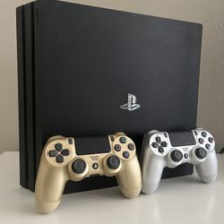 PS4 Pro 1TB w/ Controllers and Charging Station