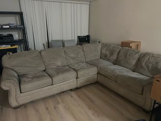 Large Gray Sectional Sofa with Nailhead Trim