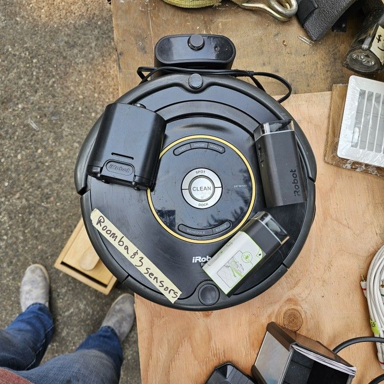 I robot Roomba With 3 Room Sensors.