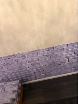 3 D peel and stick brick