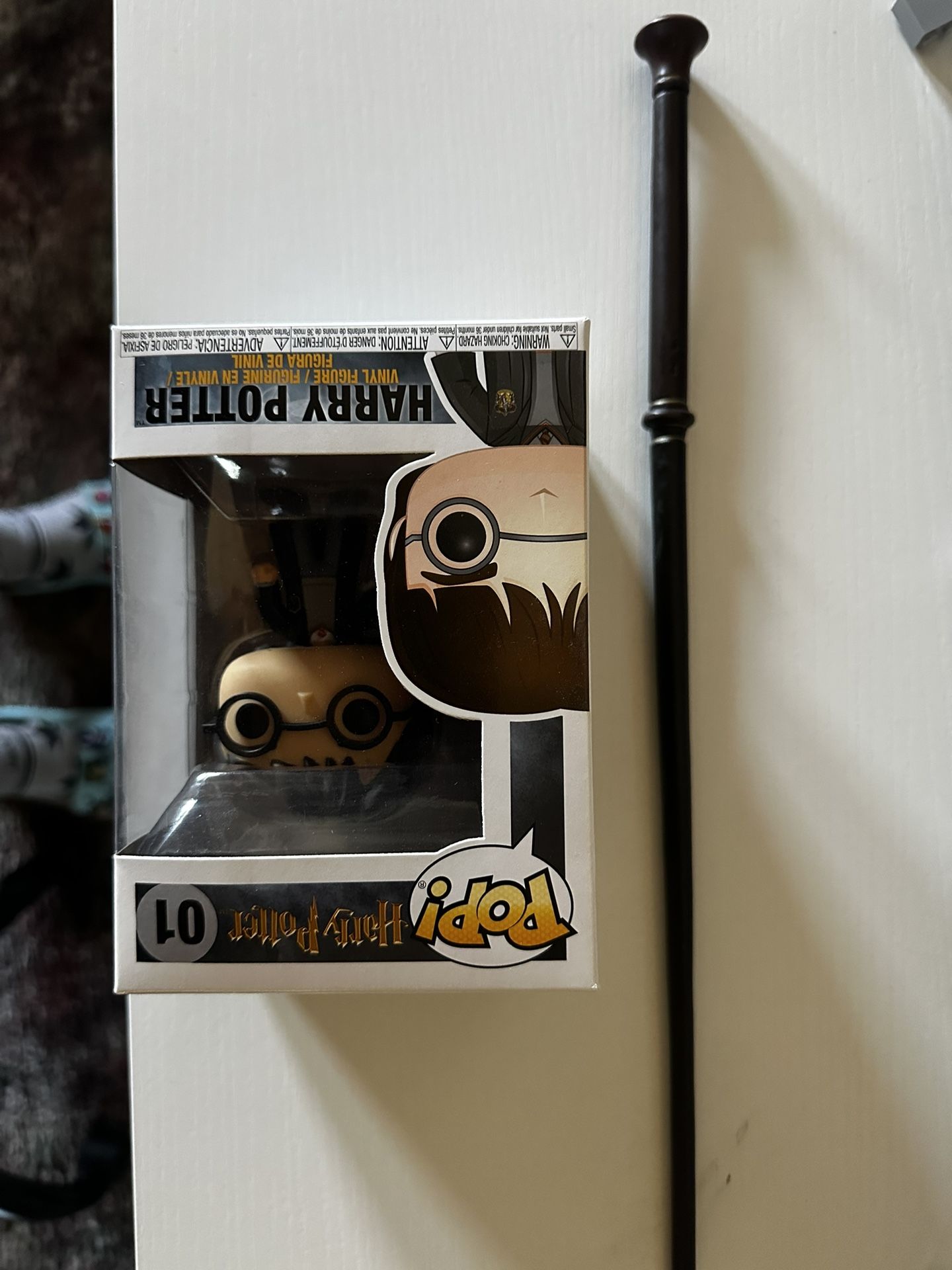 Harry Potter Wand and funko pop Universal Studios