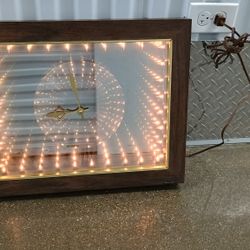 Beautiful Vintage 1970s Infinity Wall Clock model 533 see our other great vintage antiques furniture art jewelry sports collectibles now posted