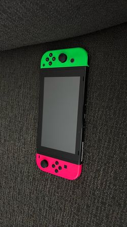 Nintendo Switch with Neon Green and Pink Joy-Cons