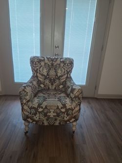 Upholstered Accent Chair with Caster Legs