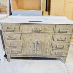 Beautiful Bathroom Vanity in Gray oak 48”, single sink, soft close and solid wood. $549 