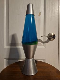 14.5" silver lava lamp with blue liquid and yellow wax