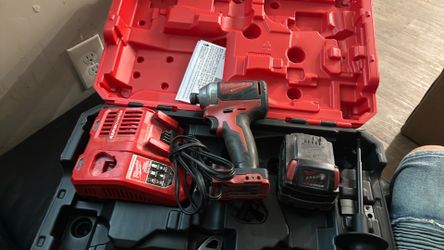 Drill , battery and charger $70