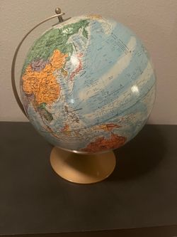 World Globe on Gold Metal Stand