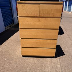 Tall wood dresser 48 high, 19 deep, 32 wide; 6 drawers, all working well.